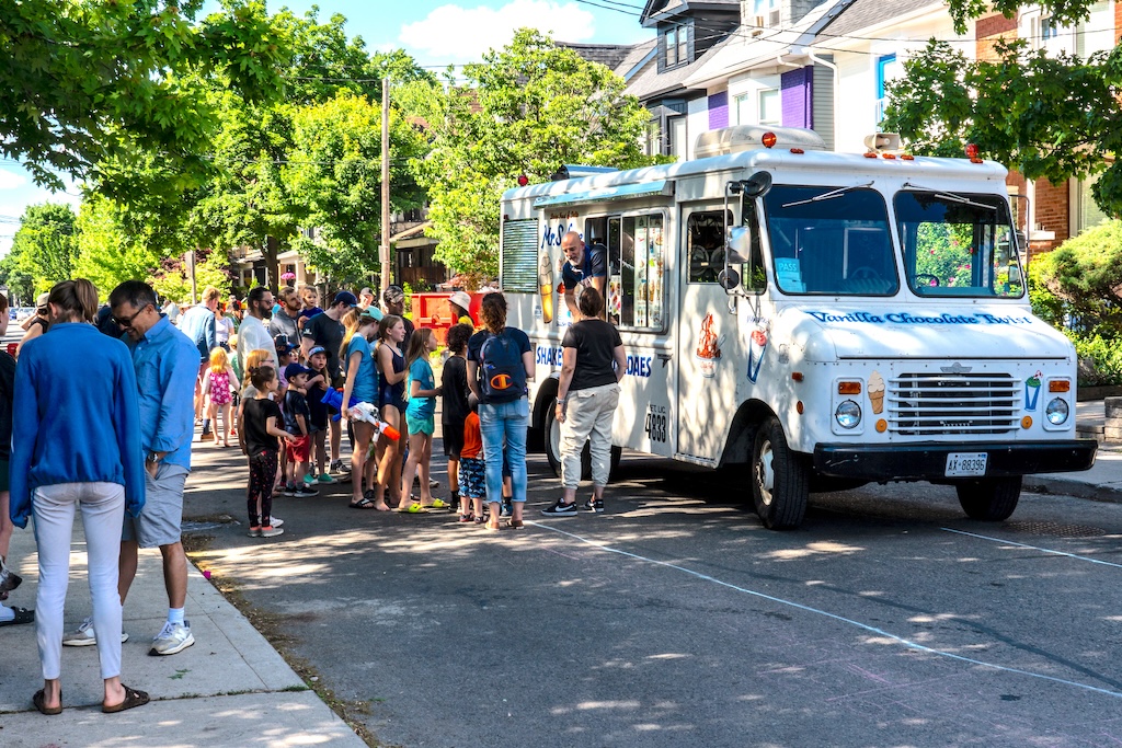 the 2022 street party people getting ice cream from the truck